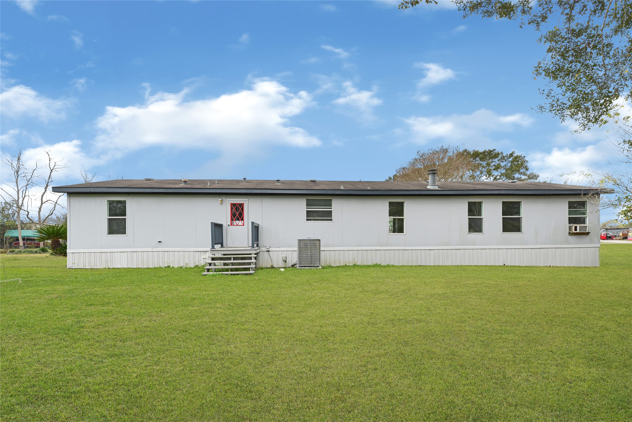3725 Allen Road Pearland, TX 77584 - Photo 25 of 43 a front view of a house with a garden and yard