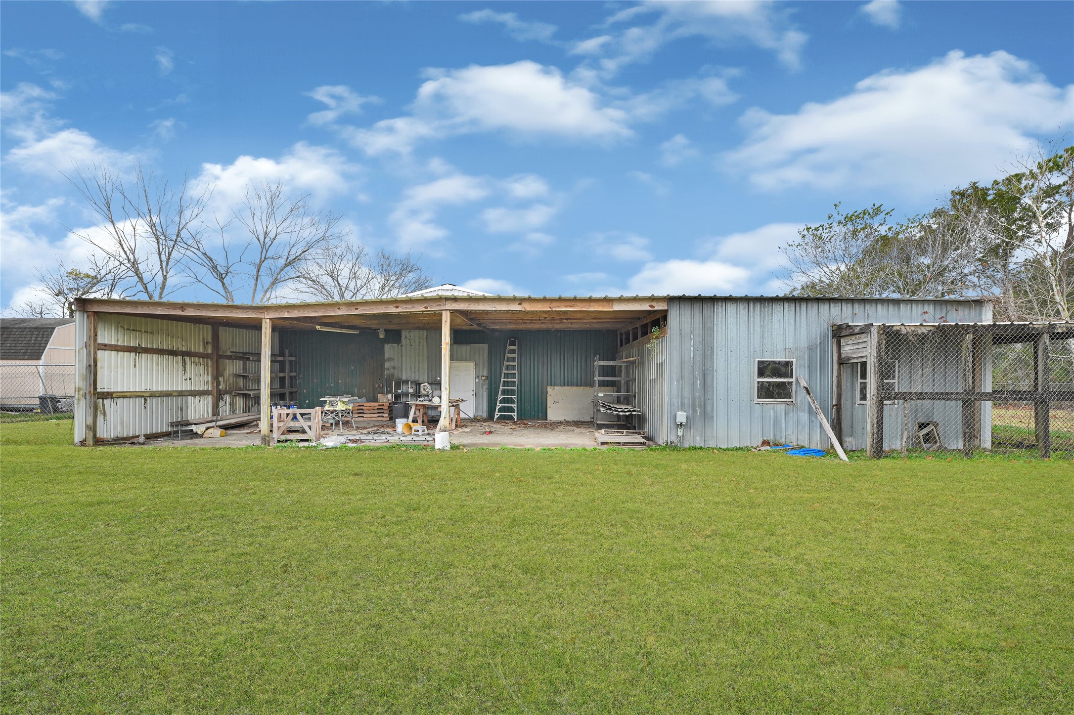 3725 Allen Road Pearland, TX 77584 - Photo 26 of 43 a view of a house with a yard and sitting area