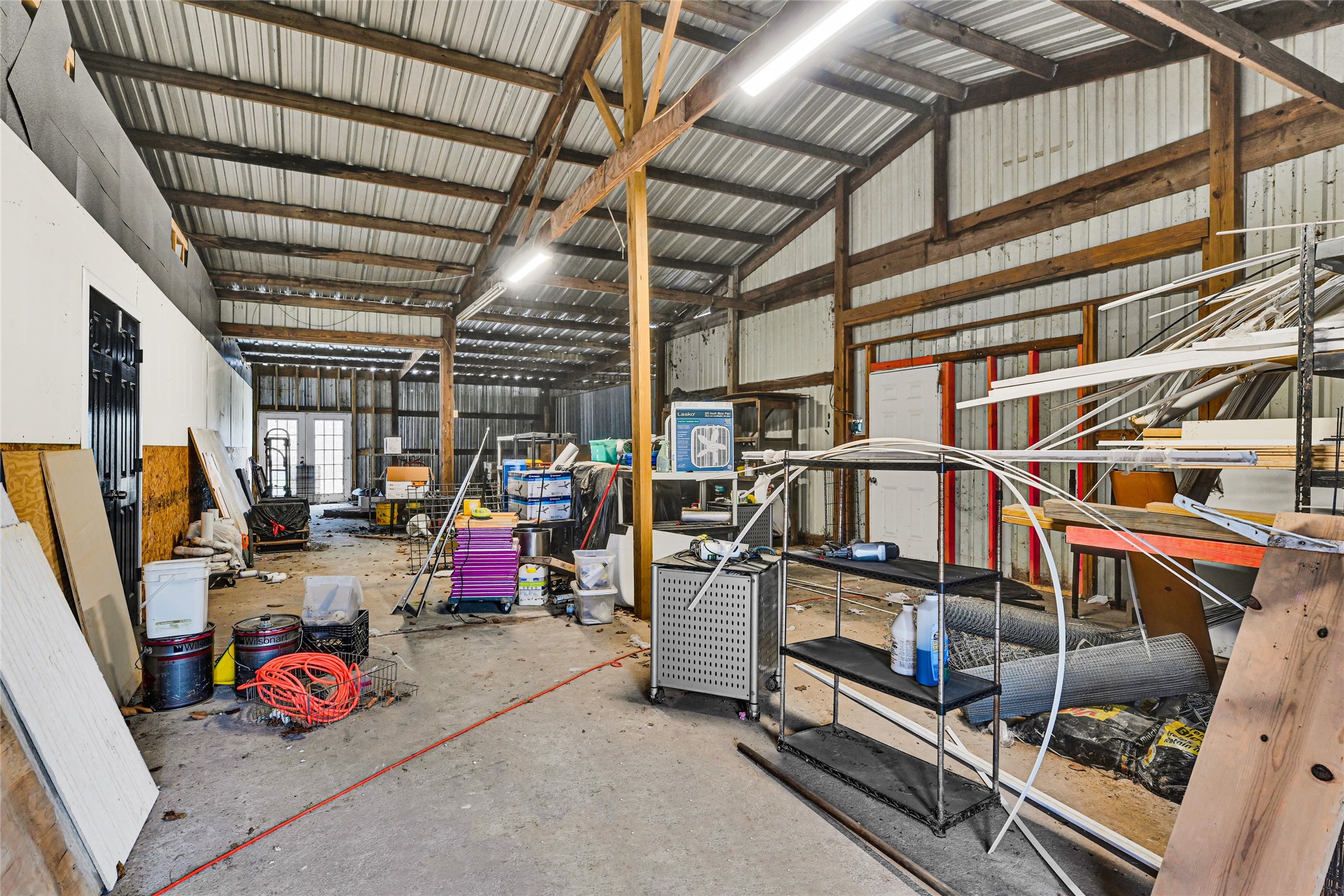 3725 Allen Road Pearland, TX 77584 - Photo 27 of 43 a storage room with lots of stuff