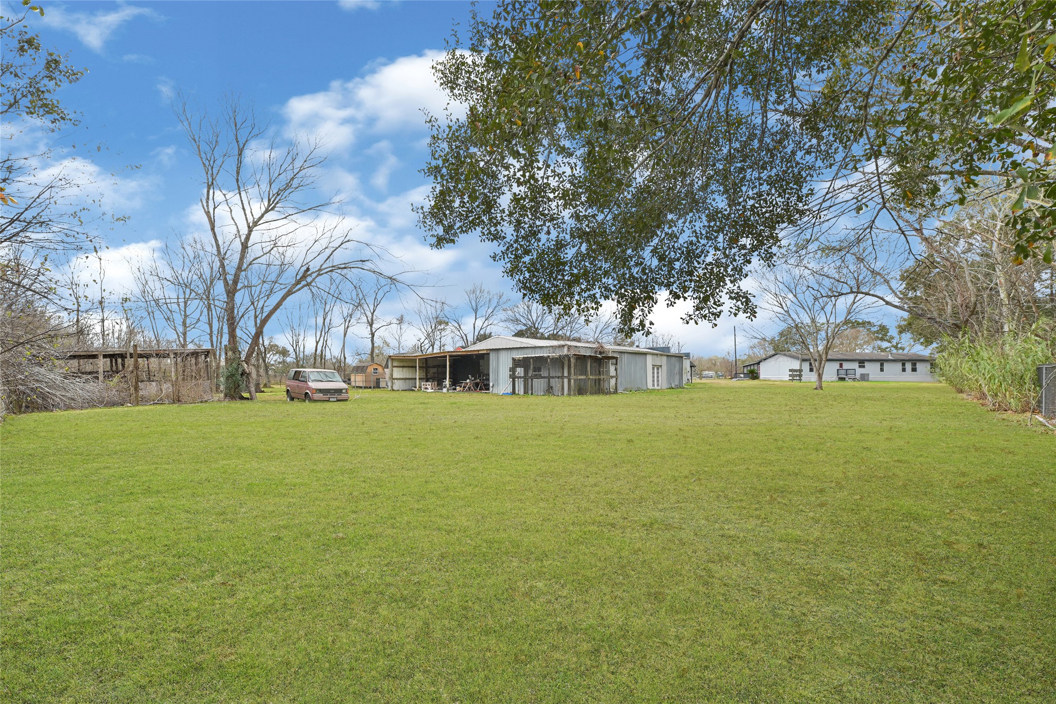 3725 Allen Road Pearland, TX 77584 - Photo 29 of 43 a view of outdoor space with garden and trees
