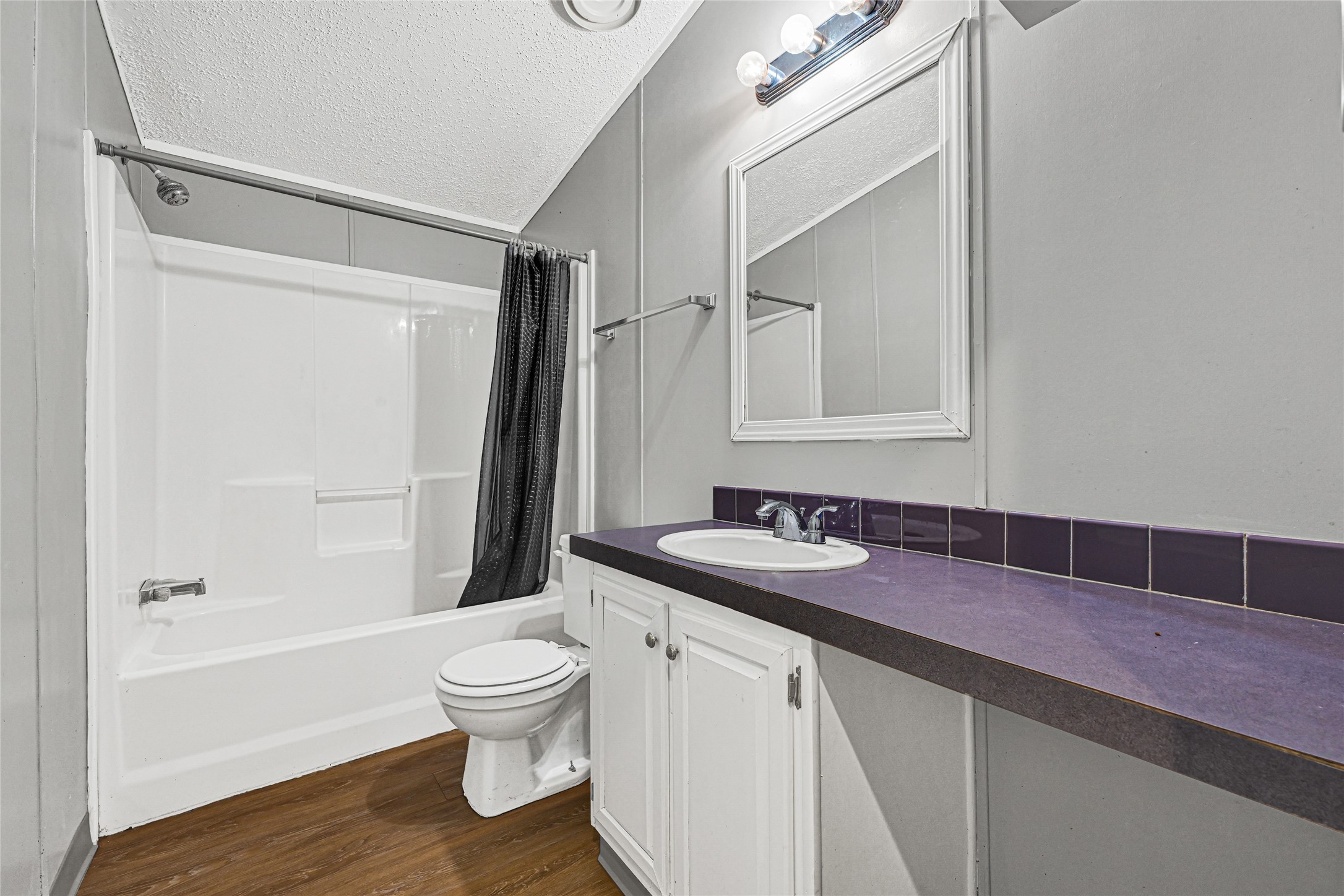 3725 Allen Road Pearland, TX 77584 - Photo 7 of 43 a bathroom with a granite countertop sink toilet and shower