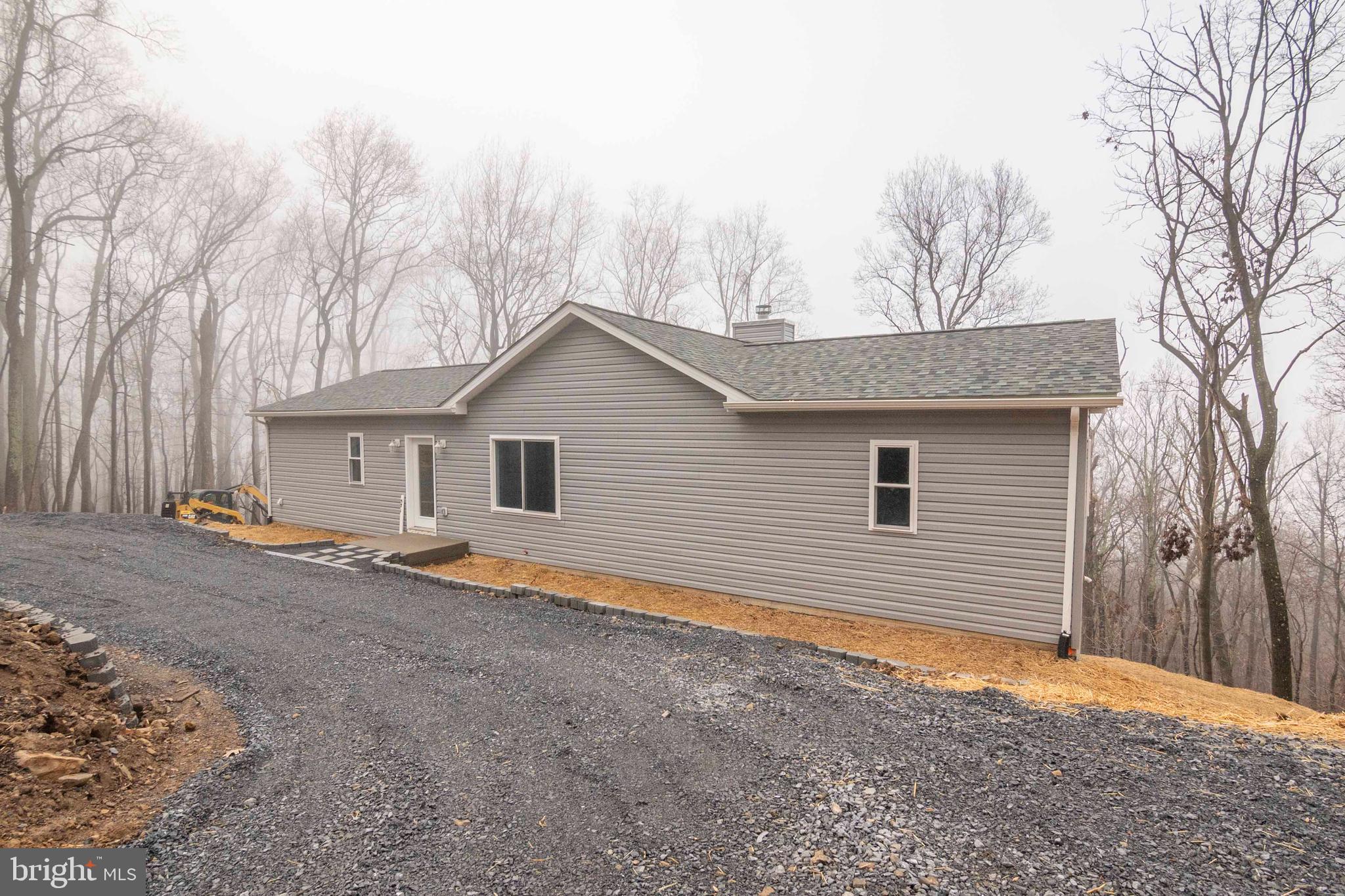 571 Wilderness Road Linden, VA 22642 - Photo 3 of 48 a view of a house with a yard