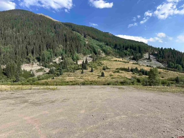 a view of a road with a yard