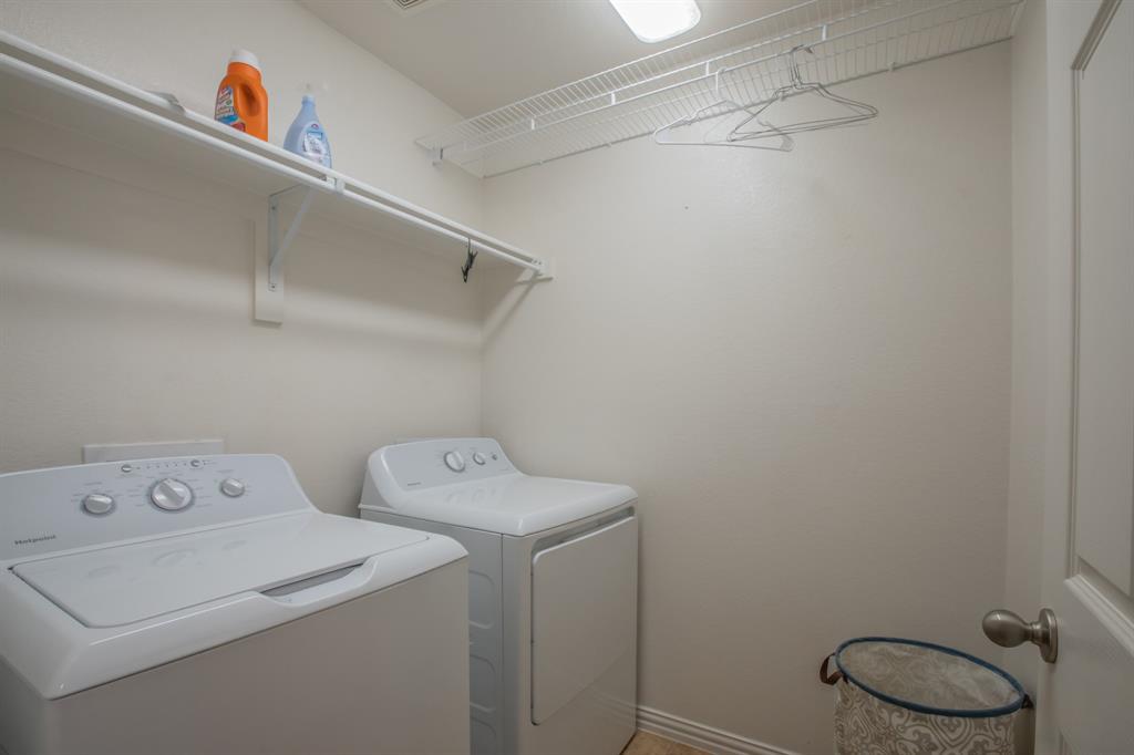 6801 Sandshell Boulevard Fort Worth, TX 76137 - Photo 20 of 28 a utility room with dryer and washer