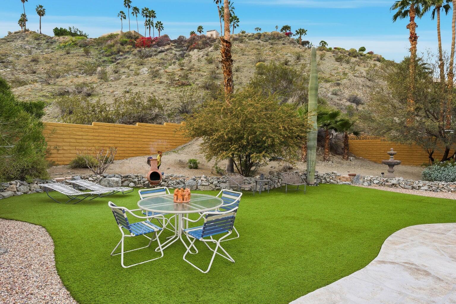 10 Venus Drive Rancho Mirage, CA 92270 - Photo 12 of 32 a view of a backyard with sitting area