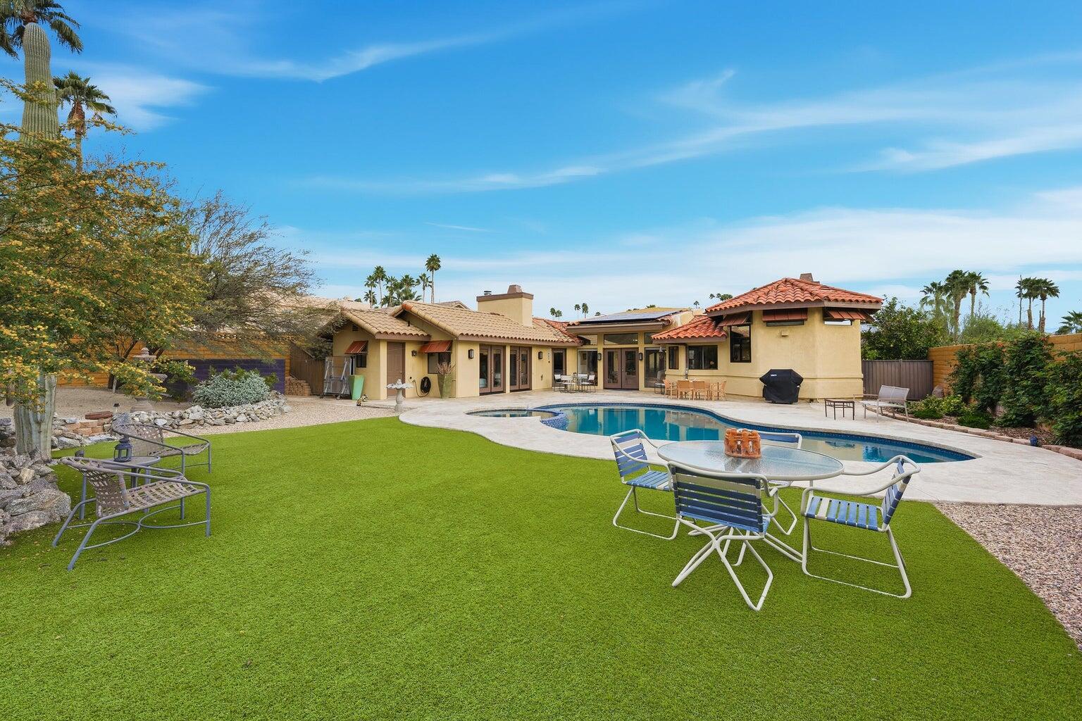 10 Venus Drive Rancho Mirage, CA 92270 - Photo 13 of 32 a aerial view of a house with swimming pool and porch