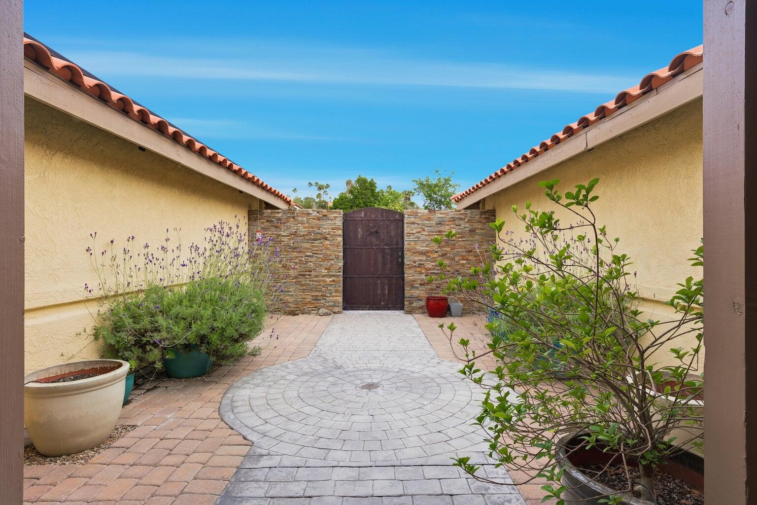10 Venus Drive Rancho Mirage, CA 92270 - Photo 18 of 32 a view of a backyard with plants