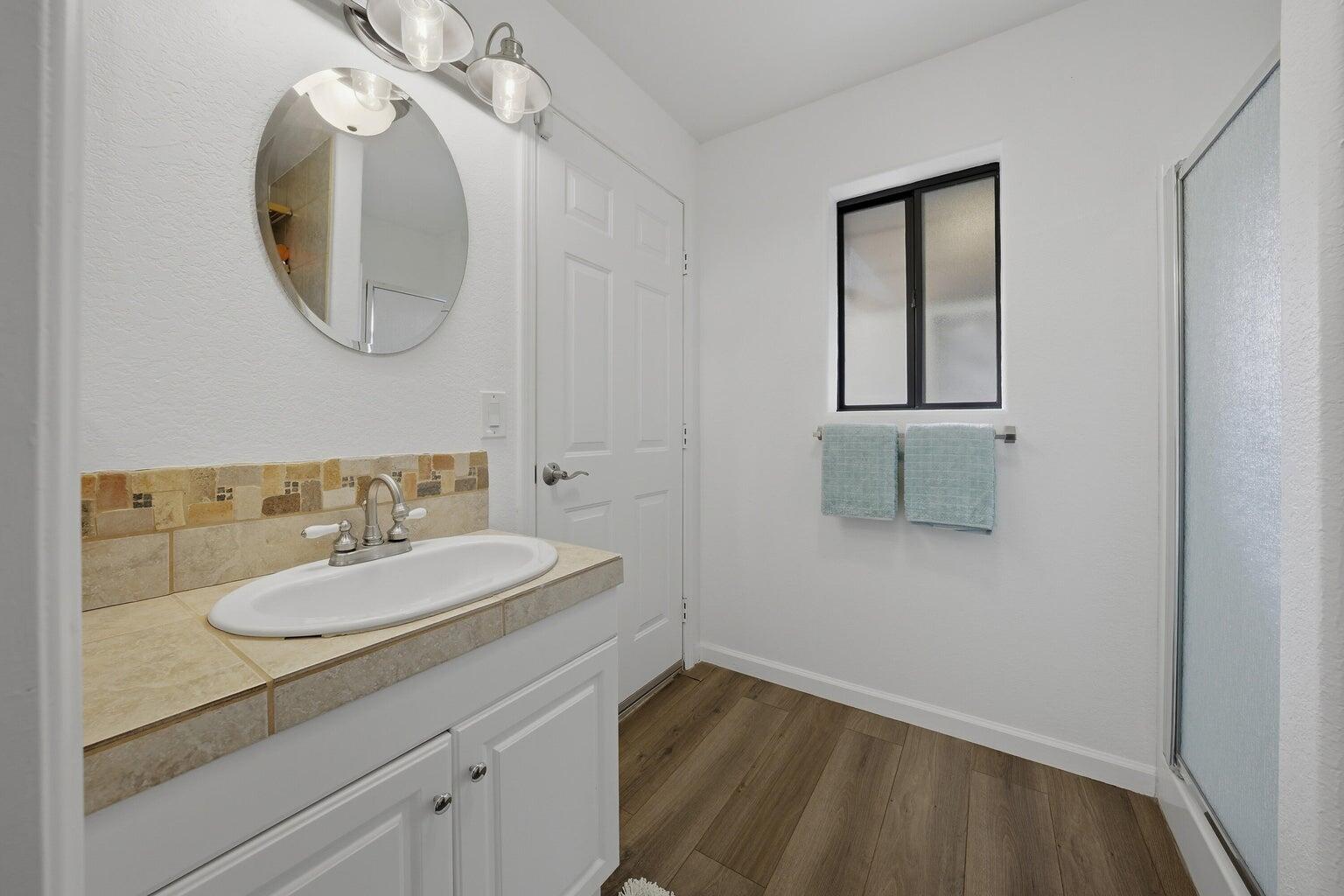 10 Venus Drive Rancho Mirage, CA 92270 - Photo 27 of 32 a bathroom with a sink and a mirror