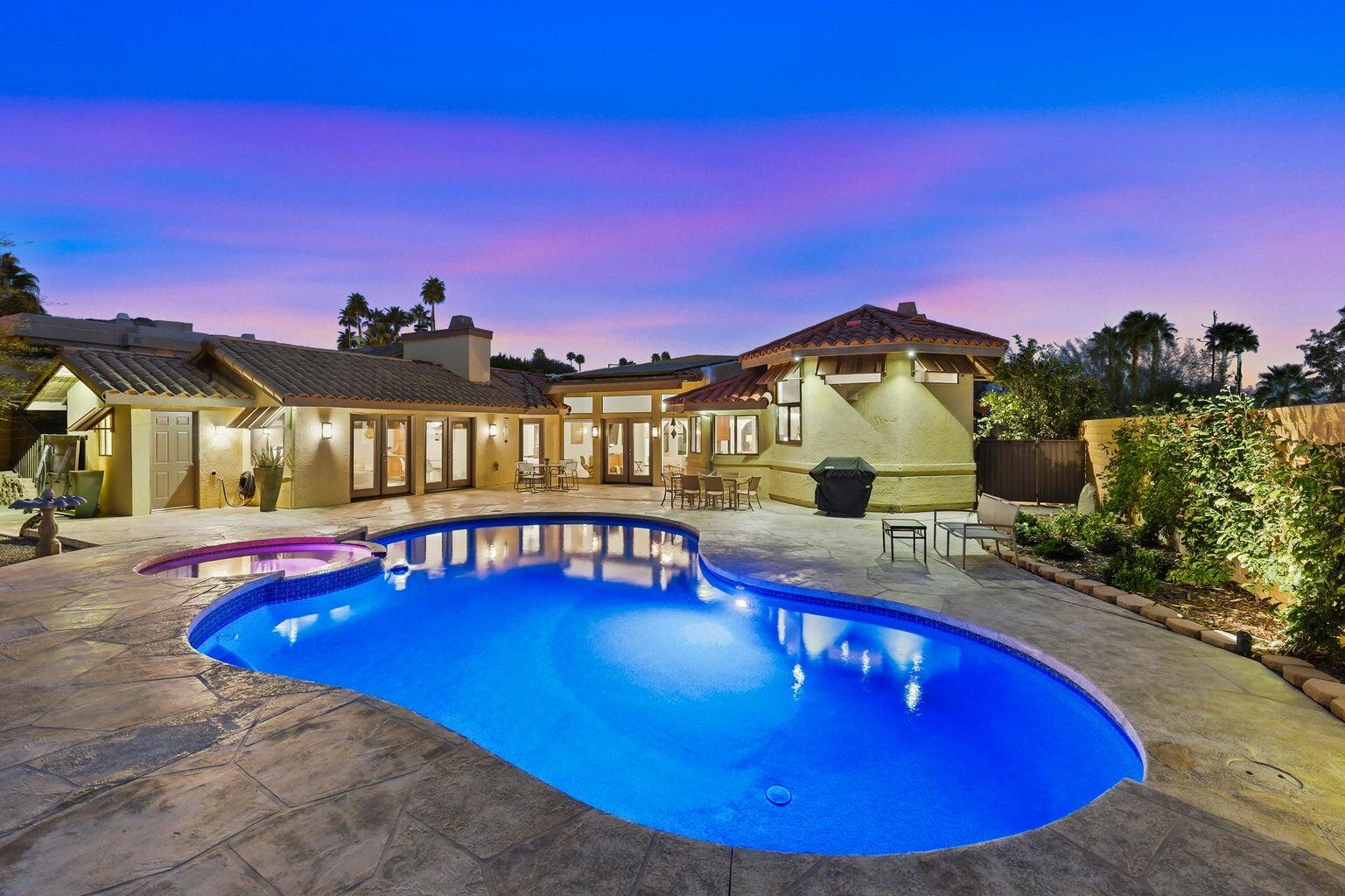 10 Venus Drive Rancho Mirage, CA 92270 - Photo 30 of 32 a view of a swimming pool with an outdoor seating