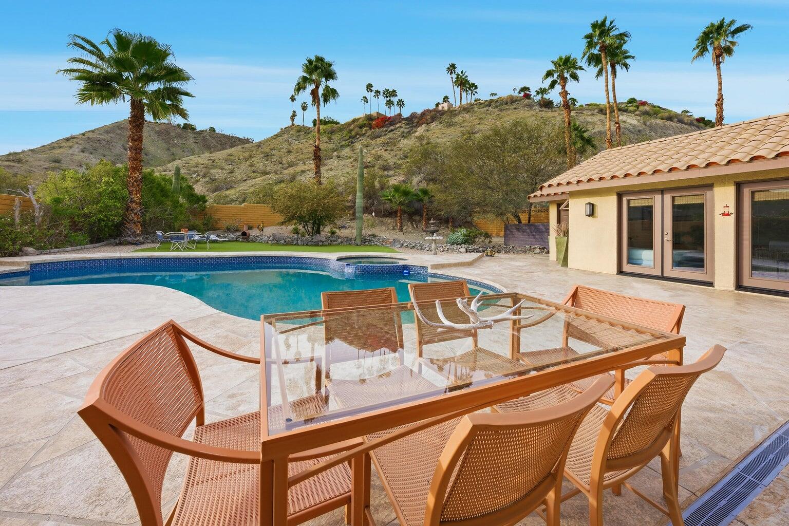 10 Venus Drive Rancho Mirage, CA 92270 - Photo 9 of 32 a view of a chairs and table on the terrace