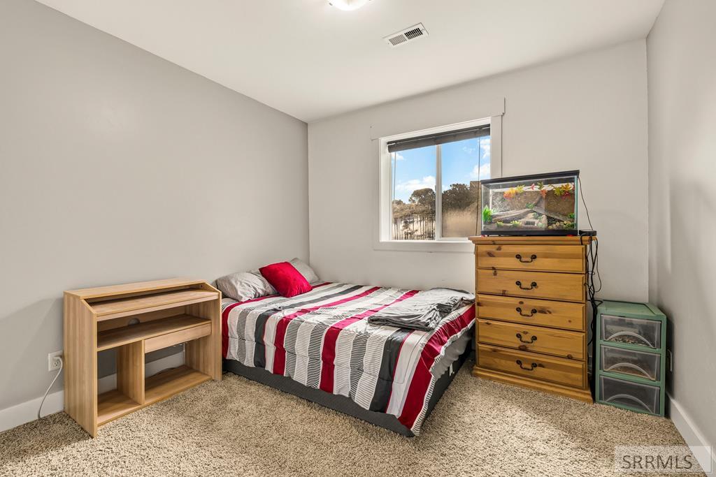 3979 Hangman's Loop Menan, ID 83434 - Photo 60 of 67 Basement Bedroom 1