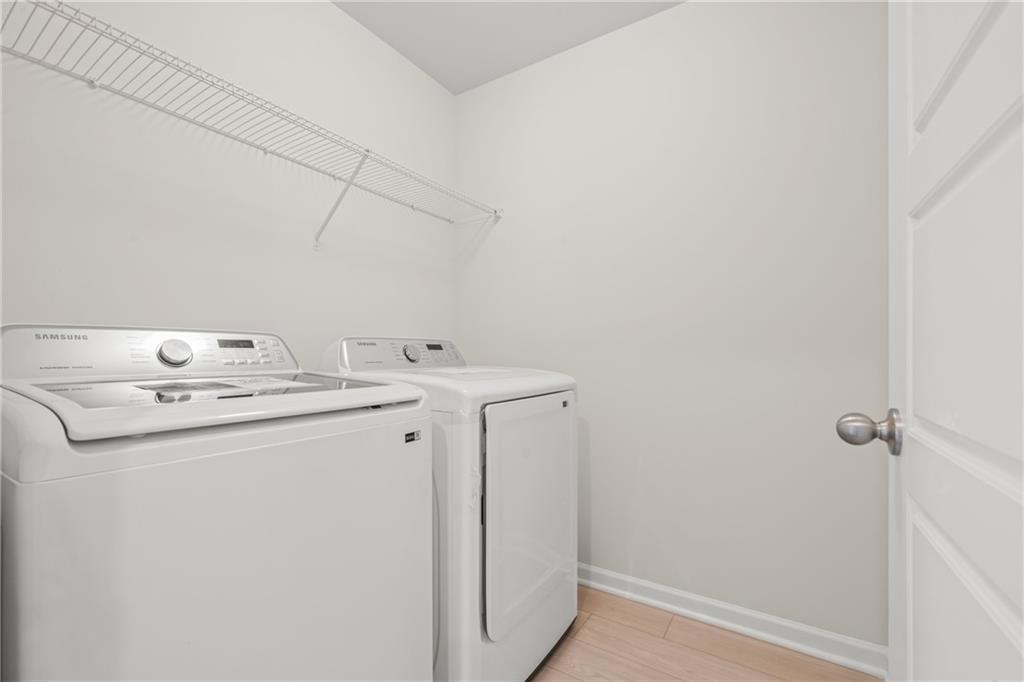32 Station Overlook Way Auburn, GA 30011 - Photo 23 of 38 a utility room with dryer and washer