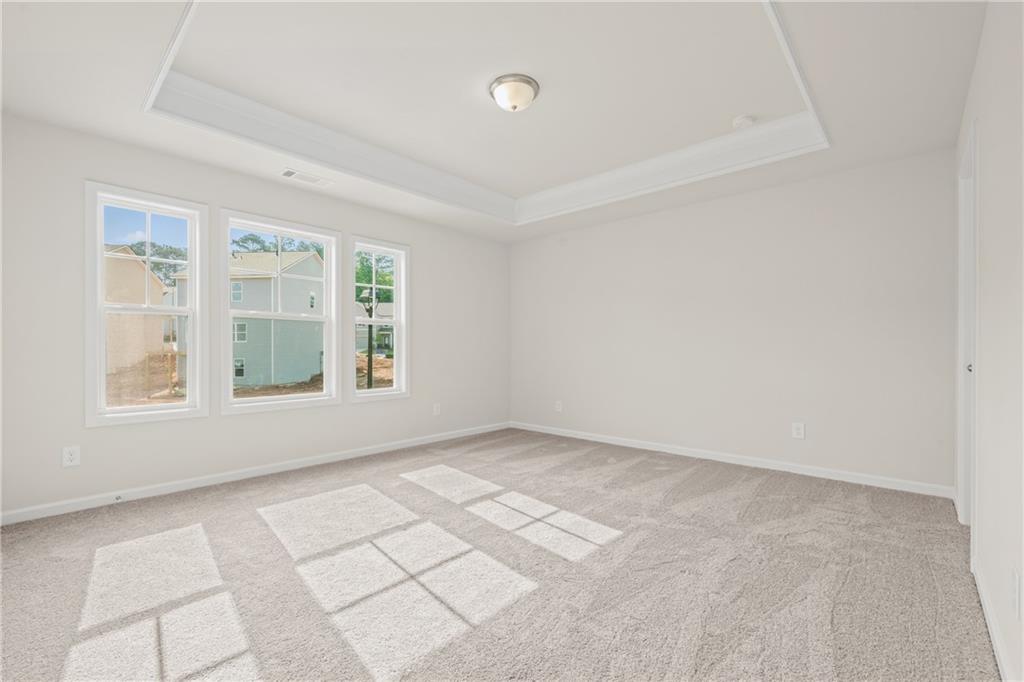 32 Station Overlook Way Auburn, GA 30011 - Photo 24 of 38 an empty room with windows
