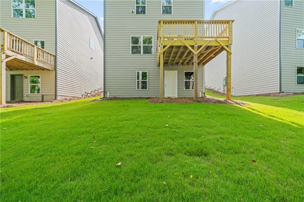32 Station Overlook Way Auburn, GA 30011 - Photo 37 of 38 a view of a back yard of the house
