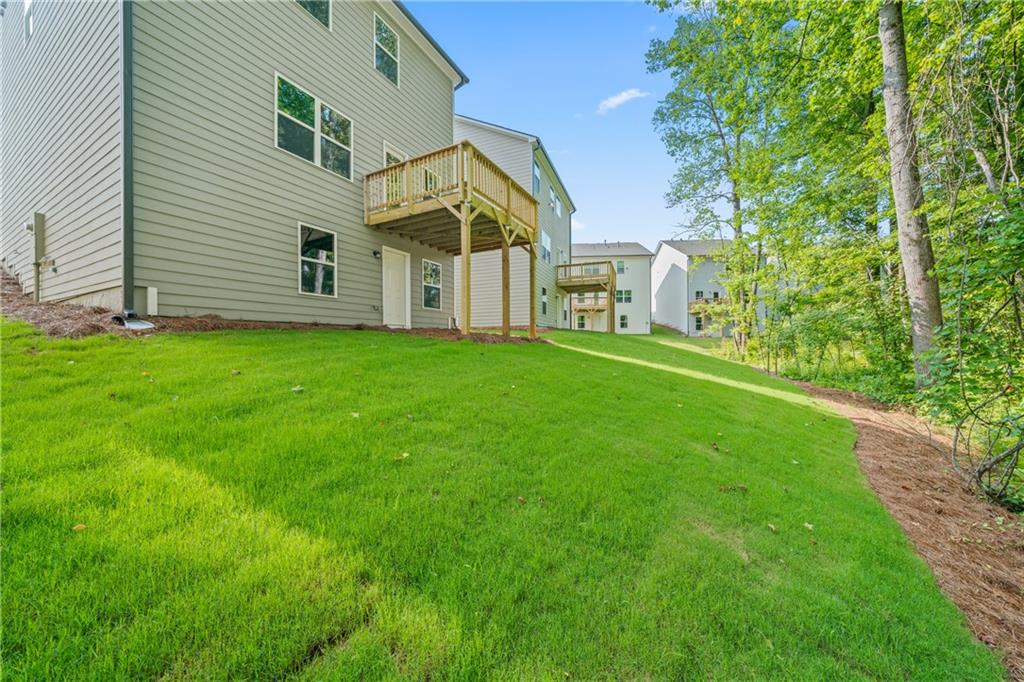 32 Station Overlook Way Auburn, GA 30011 - Photo 38 of 38 a view of a house with a yard