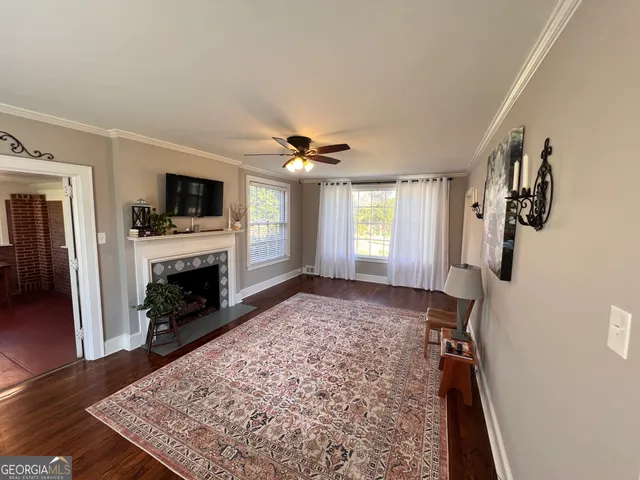 a view of a livingroom with a fireplace