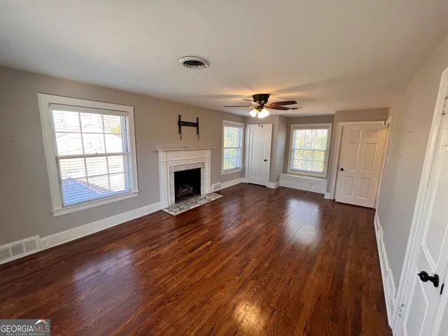 a view of entryway with wooden floor