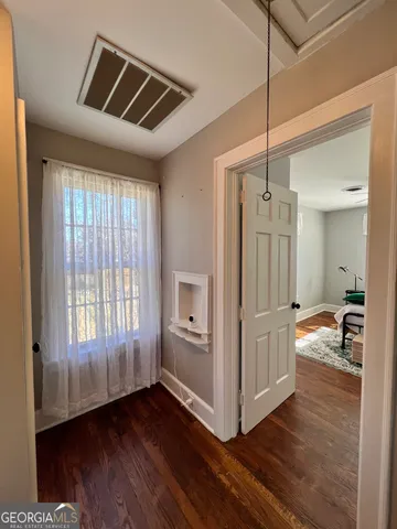 a backyard of a house with lots of green space