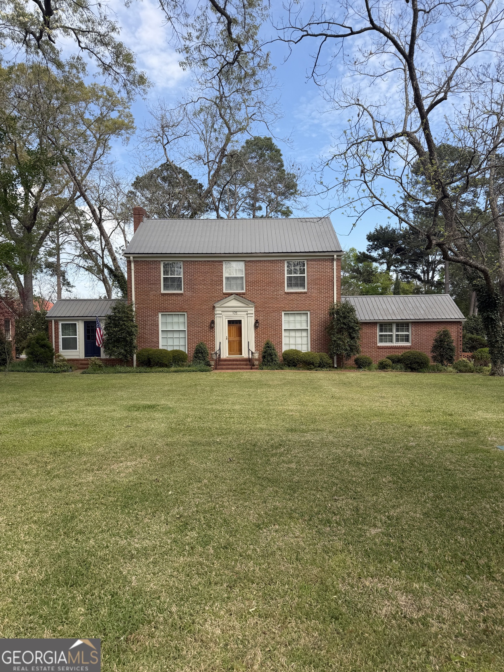 105 Lacross Street Dublin, GA 31021 - Photo 60 of 68 a front view of a house with a yard