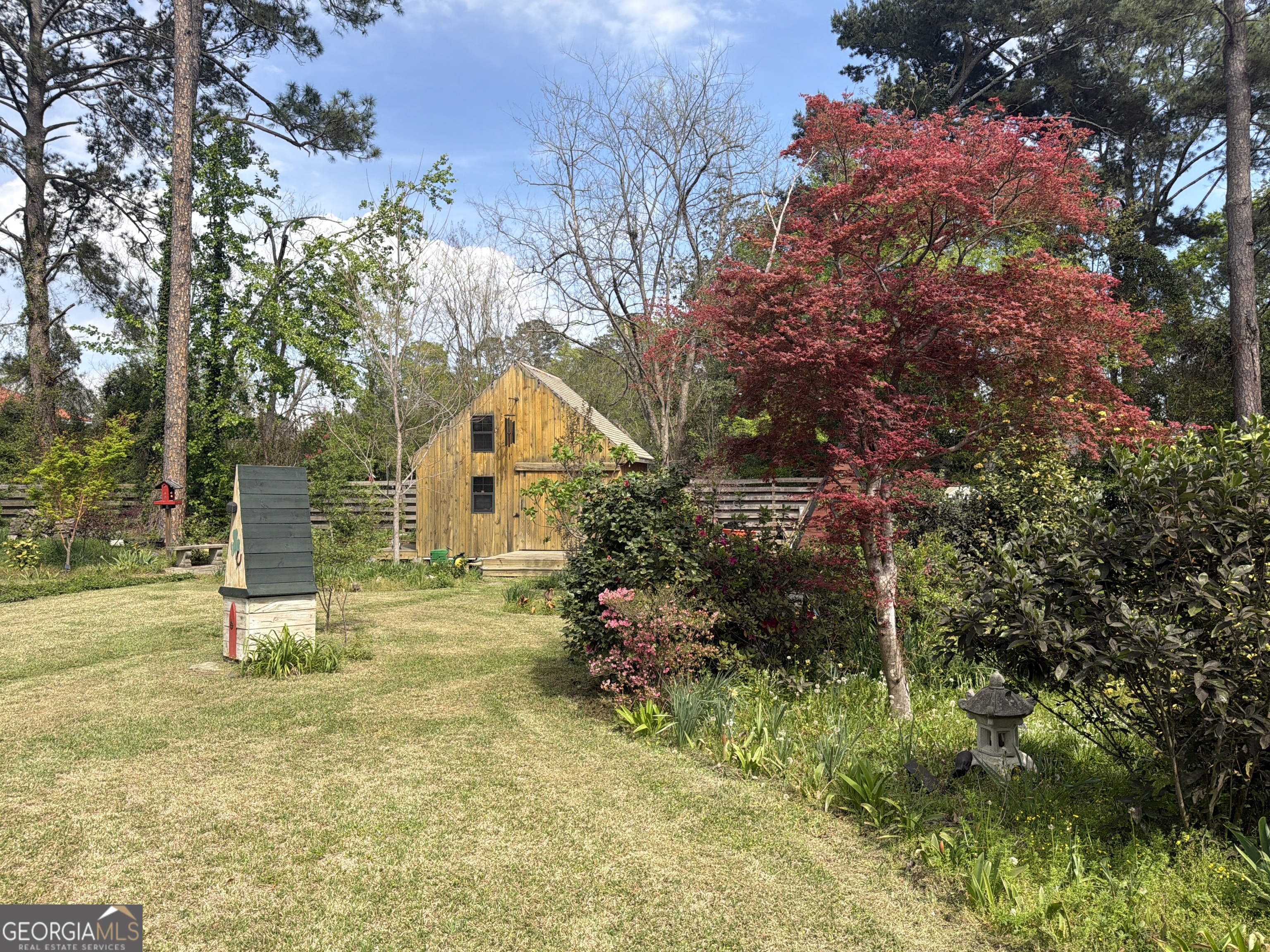 105 Lacross Street Dublin, GA 31021 - Photo 65 of 68 a view of backyard of the house
