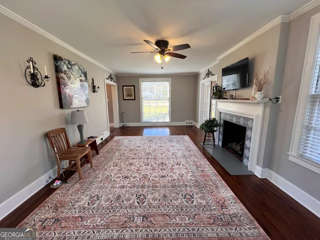 a kitchen with stainless steel appliances granite countertop a refrigerator sink and stove