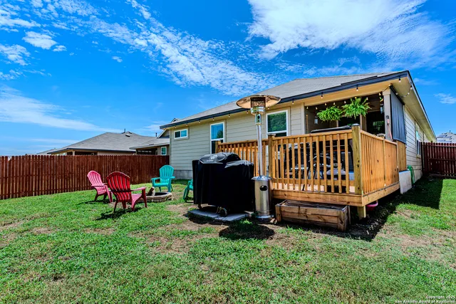 a view of a lake with a house in the background