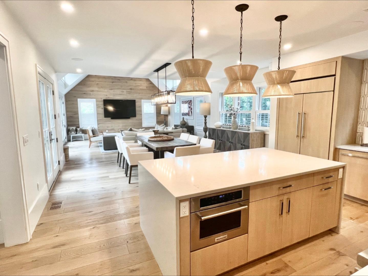 9 A Pilgrim Road Nantucket, MA 02554 - Photo 13 of 34 a kitchen with a stove a refrigerator and a wooden floor