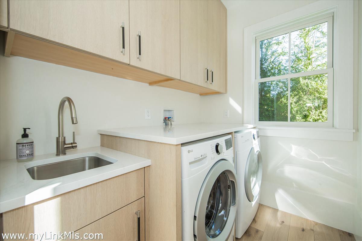 9 A Pilgrim Road Nantucket, MA 02554 - Photo 16 of 34 a utility room with dryer and washer