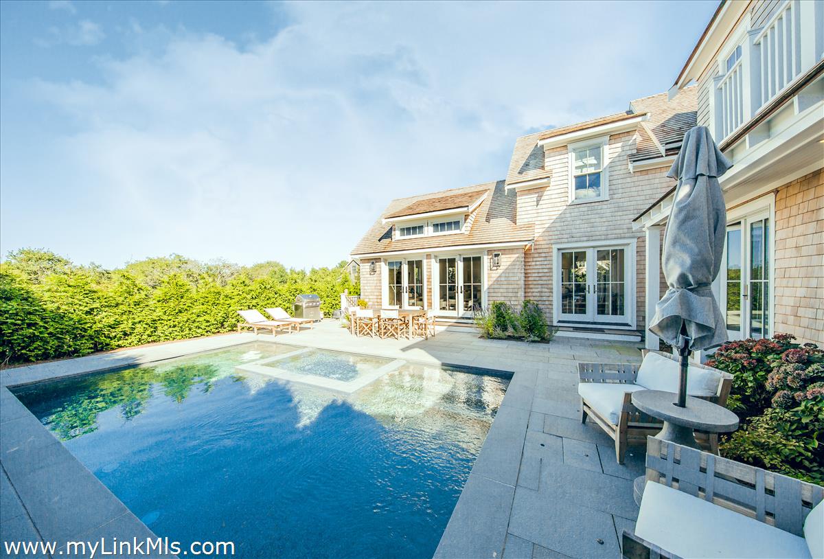 9 A Pilgrim Road Nantucket, MA 02554 - Photo 2 of 34 a view of a house with backyard porch and sitting area
