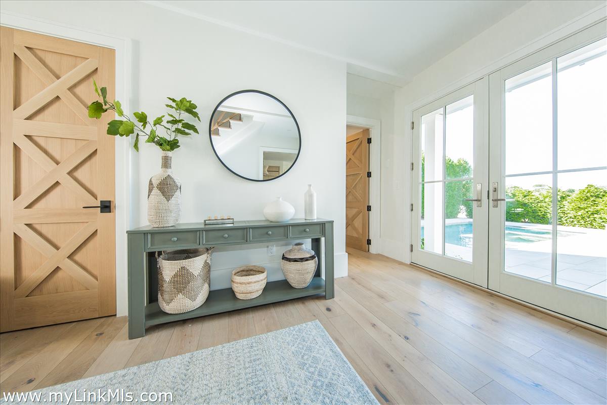 9 A Pilgrim Road Nantucket, MA 02554 - Photo 5 of 34 a view of an entryway with wooden floor