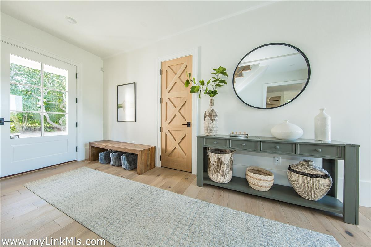 9 A Pilgrim Road Nantucket, MA 02554 - Photo 6 of 34 a bathroom with a sink mirror and window