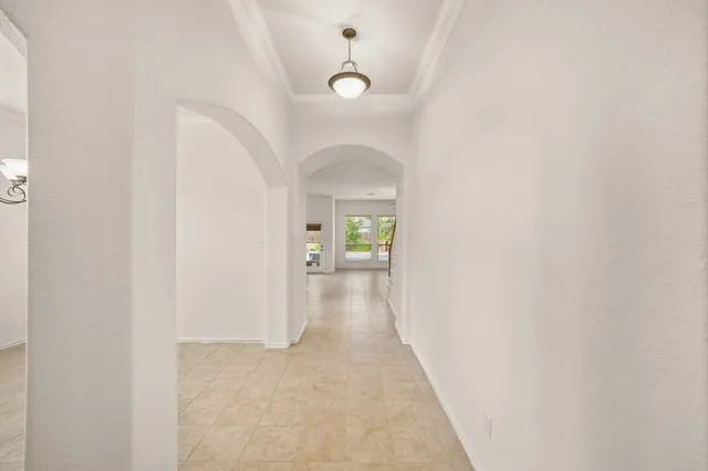 a view of a hallway with a white walls