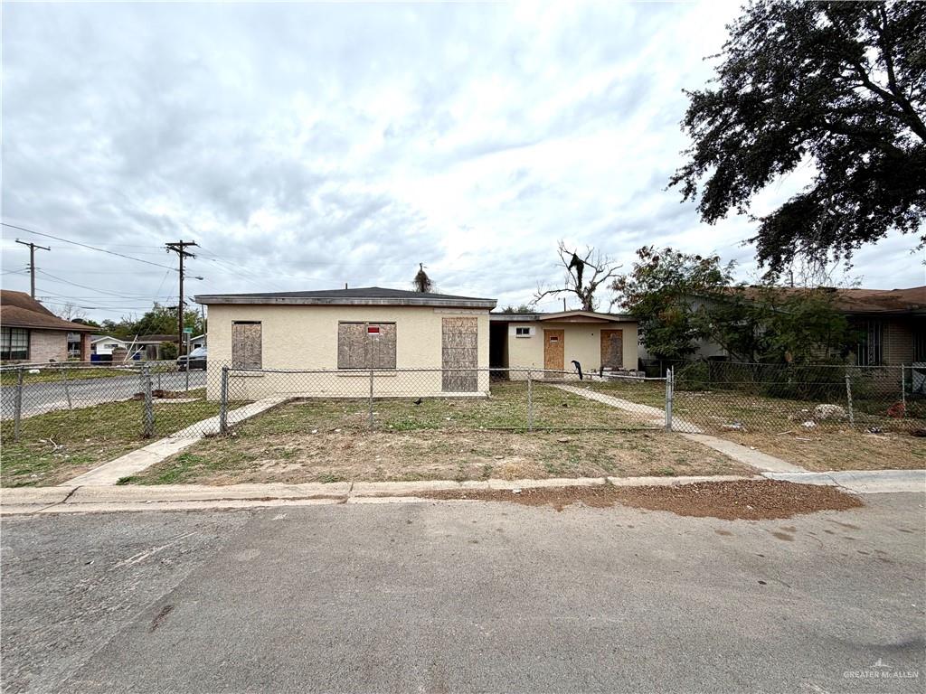 1101 North 19th Street McAllen, TX 78501 - Photo 5 of 7 a view of a house with backyard and a tree