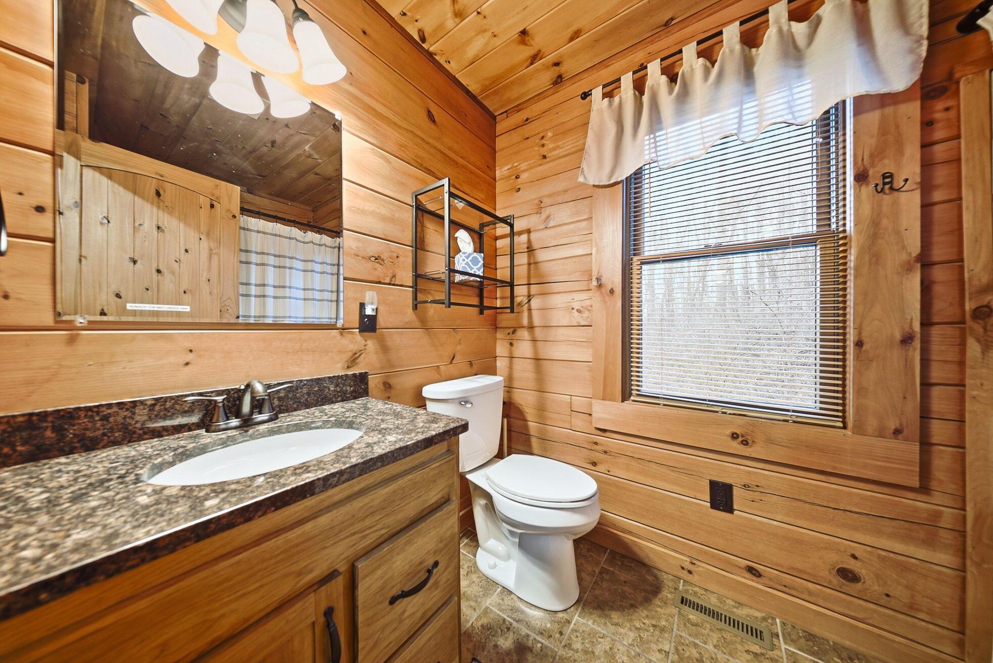 15399 Clapper Hollow Road Laurelville, OH 43135 - Photo 23 of 61 Main Level Full Bathroom adjacent to Kitchen with Granite Countertop Vanity and Shower with Tub