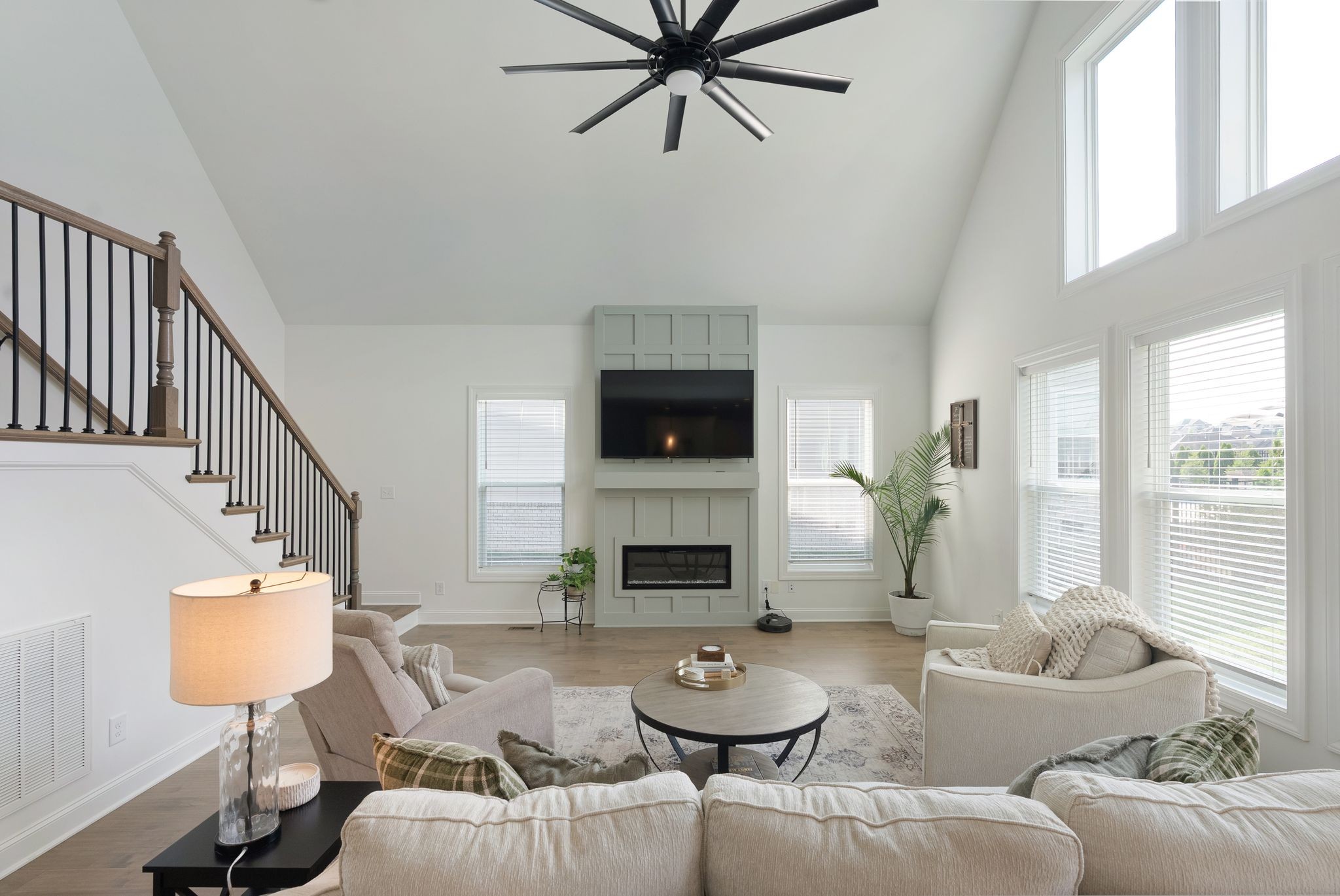 503 Smokey Ridge La Vergne, TN 37086 - Photo 13 of 38 a living room with furniture a fireplace and a flat screen tv