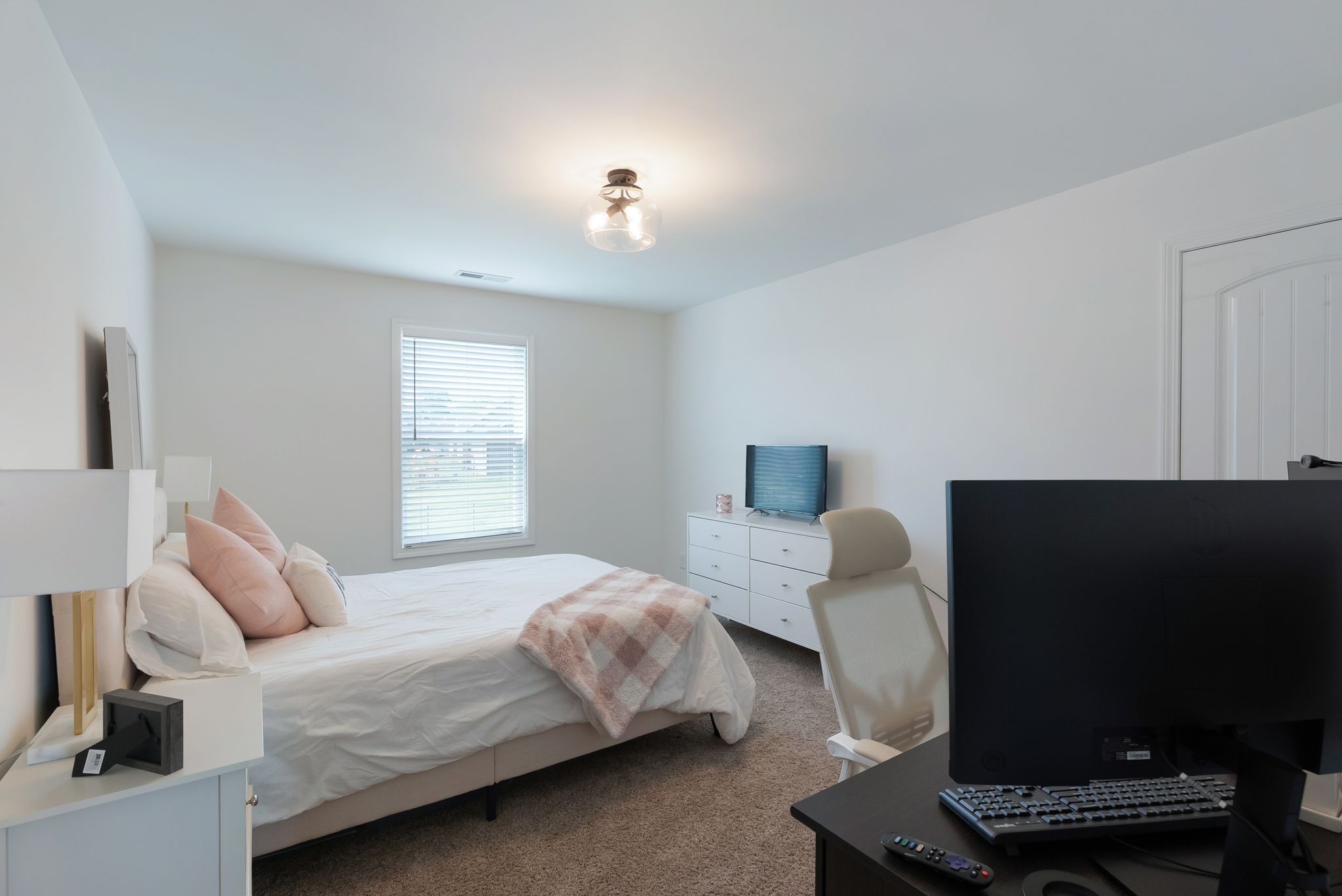 503 Smokey Ridge La Vergne, TN 37086 - Photo 30 of 38 a bedroom with a bed and a window