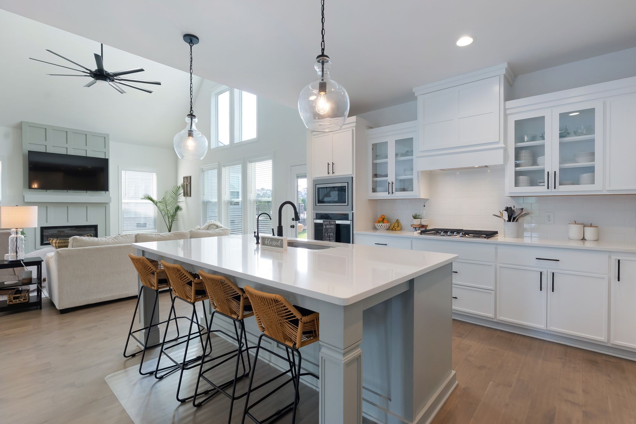 503 Smokey Ridge La Vergne, TN 37086 - Photo 7 of 38 a kitchen with stainless steel appliances granite countertop a stove a sink a kitchen island with a dining table and chairs