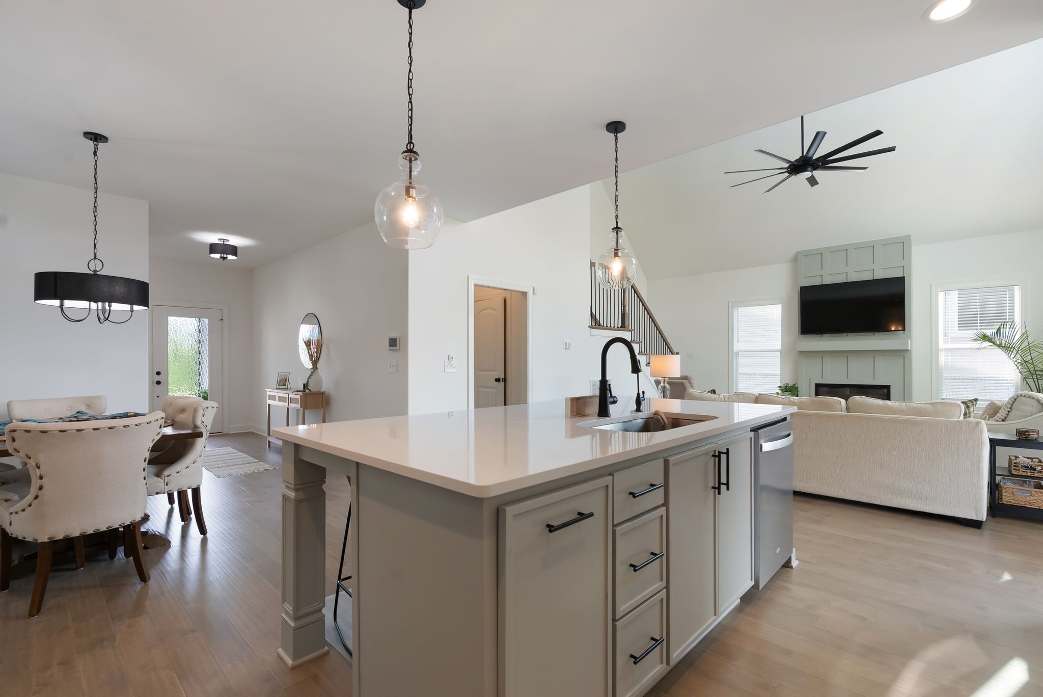 503 Smokey Ridge La Vergne, TN 37086 - Photo 10 of 38 a kitchen with a sink a stove and a wooden floor