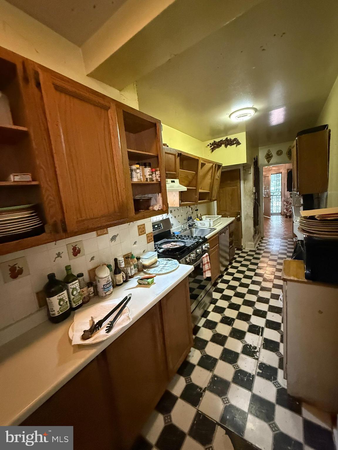 2812 6th Street Northeast Washington, DC 20017 - Photo 3 of 11 a kitchen with a sink a stove and cabinets