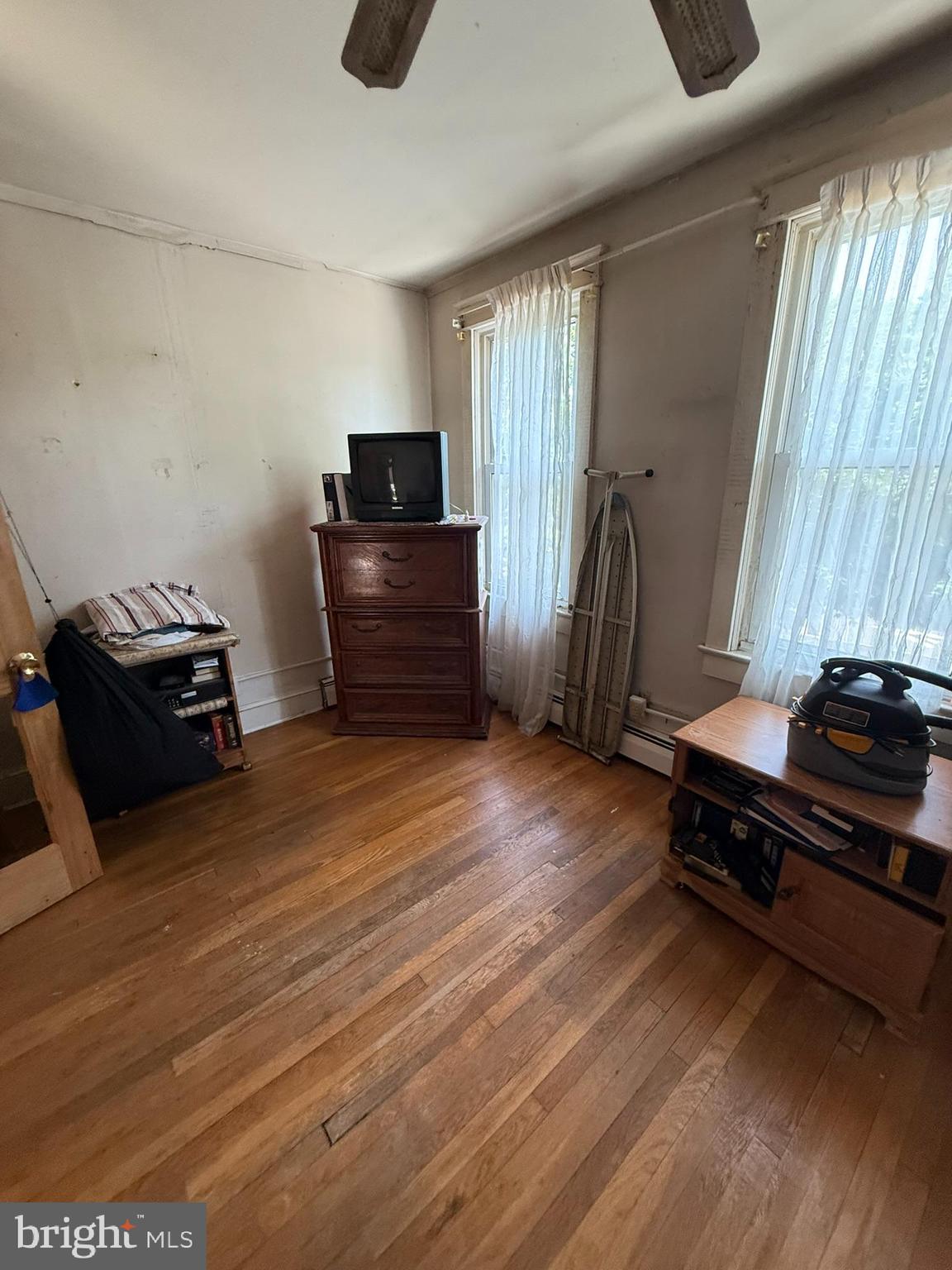2812 6th Street Northeast Washington, DC 20017 - Photo 7 of 11 a room with wooden floor and furniture