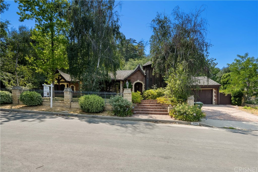 4301 Valley Meadow Road Encino, CA 91436 - Photo 1 of 1 front view of a house with a street