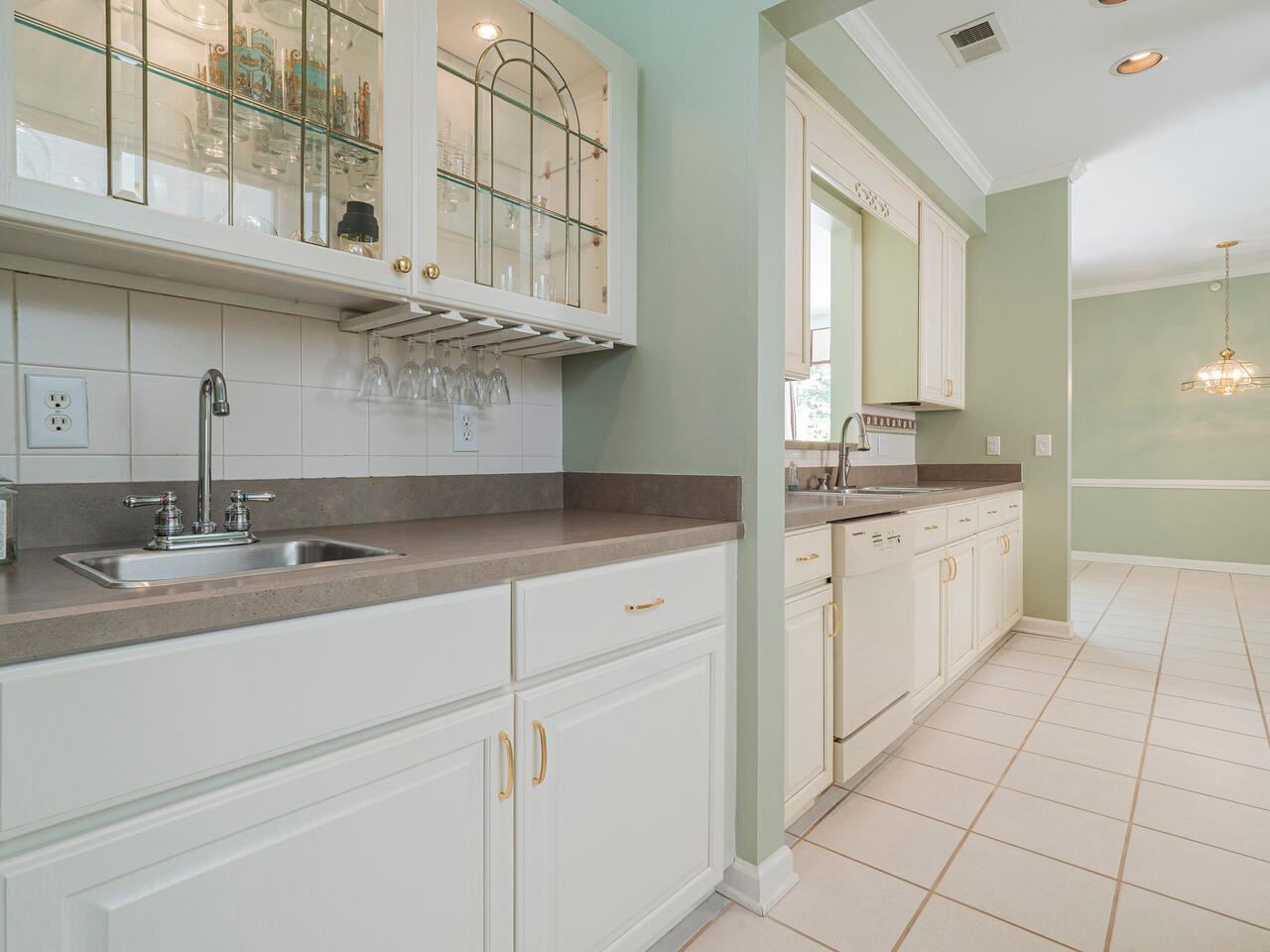 3701 Holly Lane, Unit 302 Raleigh, NC 27612 - Photo 9 of 30 Wet bar between dining room and kitchen and across from walk-in pantry. Other