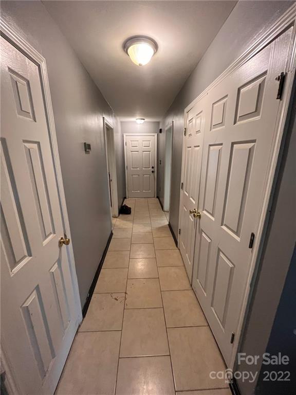 1143 Hannah Rae Court Charlotte, NC 28214 - Photo 14 of 21 a view of a hallway with wooden floor