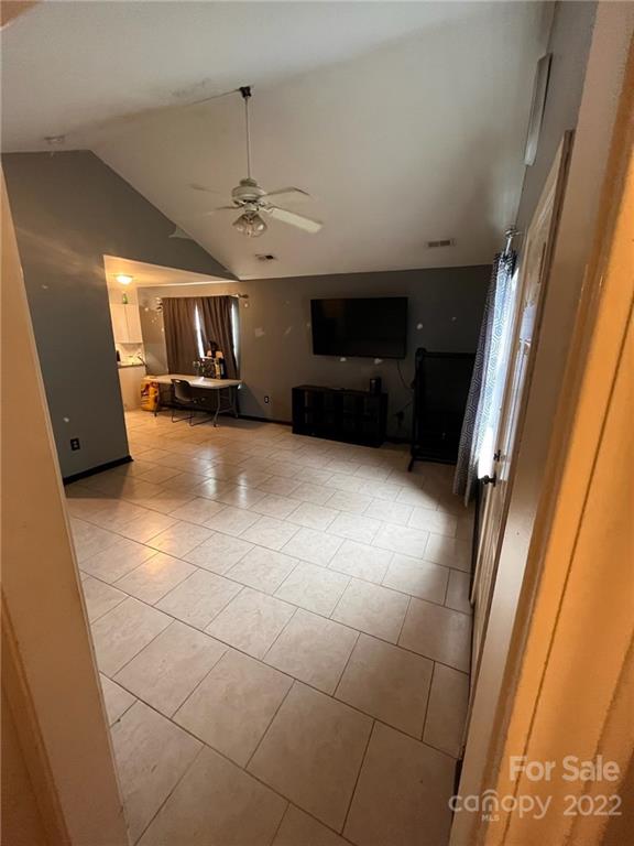 1143 Hannah Rae Court Charlotte, NC 28214 - Photo 15 of 21 a view of a livingroom with furniture and a ceiling fan