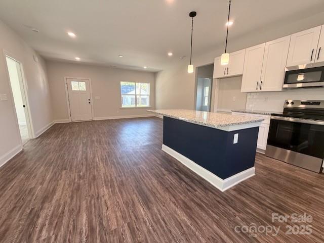 212 Queens Court Gastonia, NC 28052 - Photo 14 of 42 a kitchen with stainless steel appliances granite countertop a sink a stove and a wooden floors