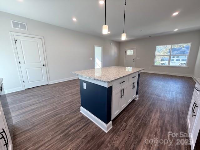 212 Queens Court Gastonia, NC 28052 - Photo 15 of 42 a kitchen with a sink and wooden floor