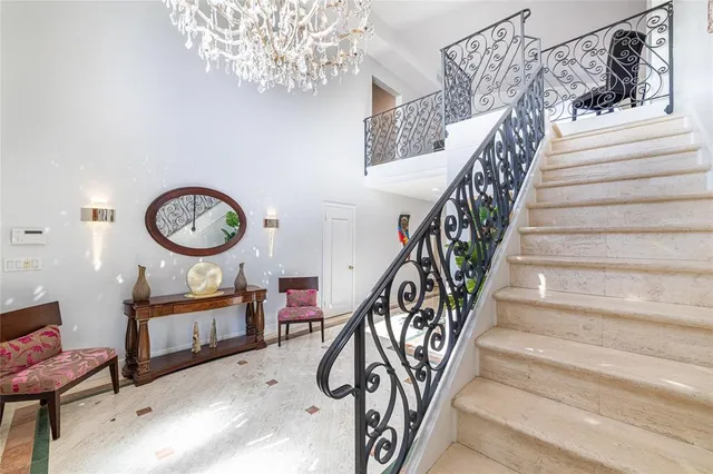 a view of a hallway with staircase