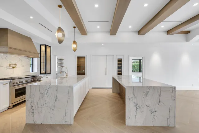 a view of an empty room with windows