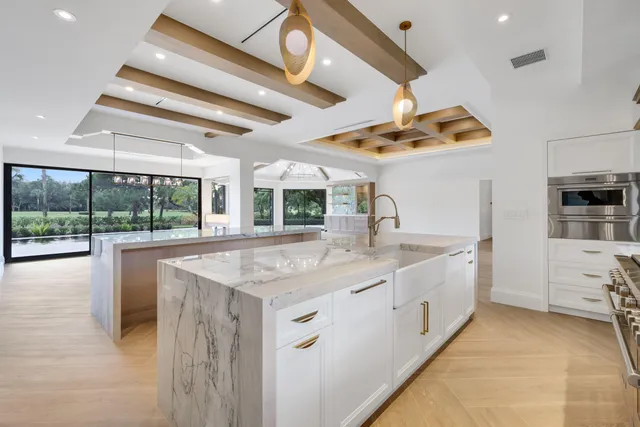a view of an empty room with sliding glass door