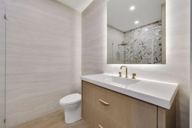 a view of an empty room with windows